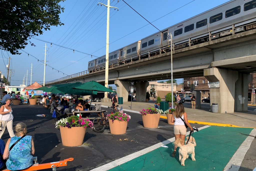 People and dog in the Village of Lindenhurst, NY after walkability study.