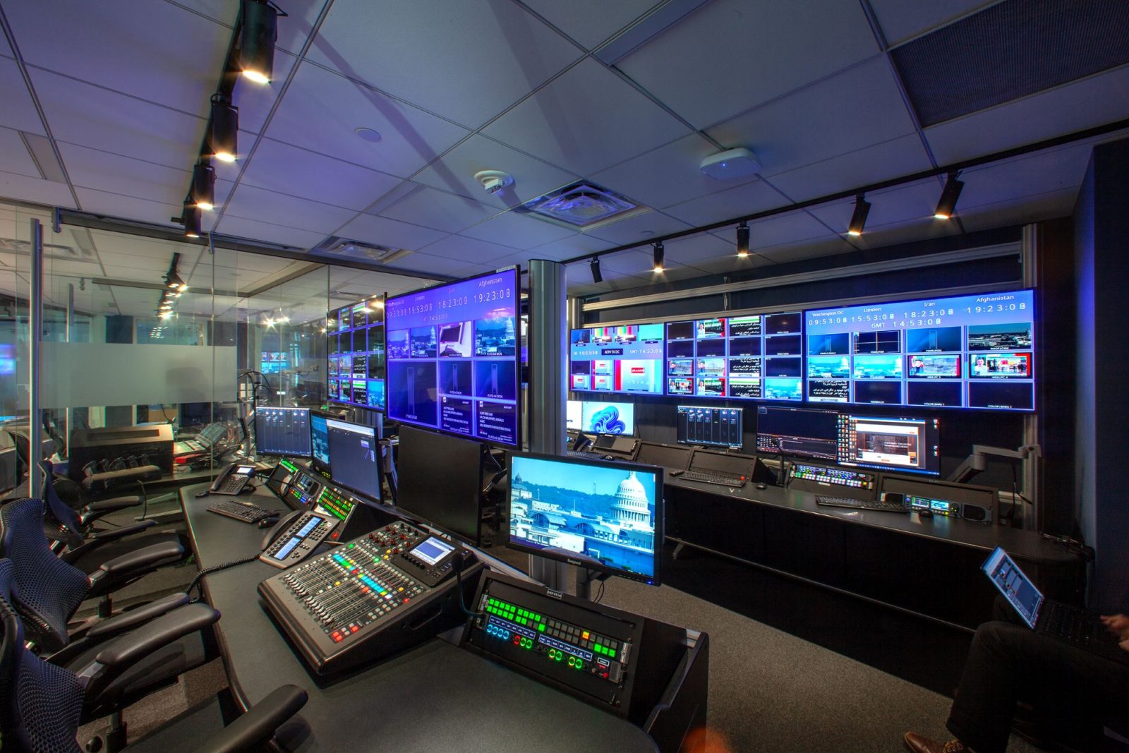 Modern media control room with screens