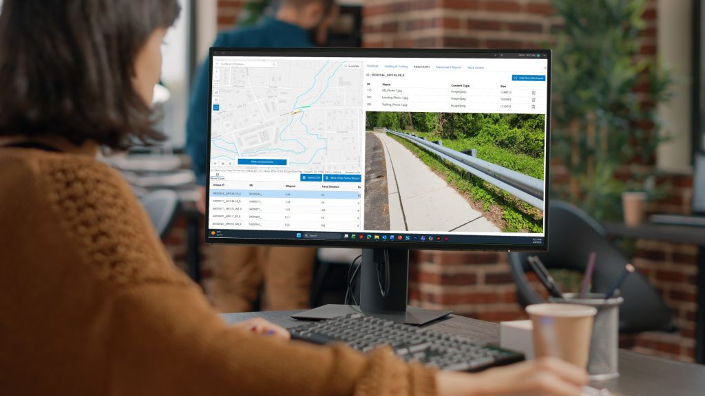 Camden County Guiderail Information Management System (GRIMS) displayed on laptop.