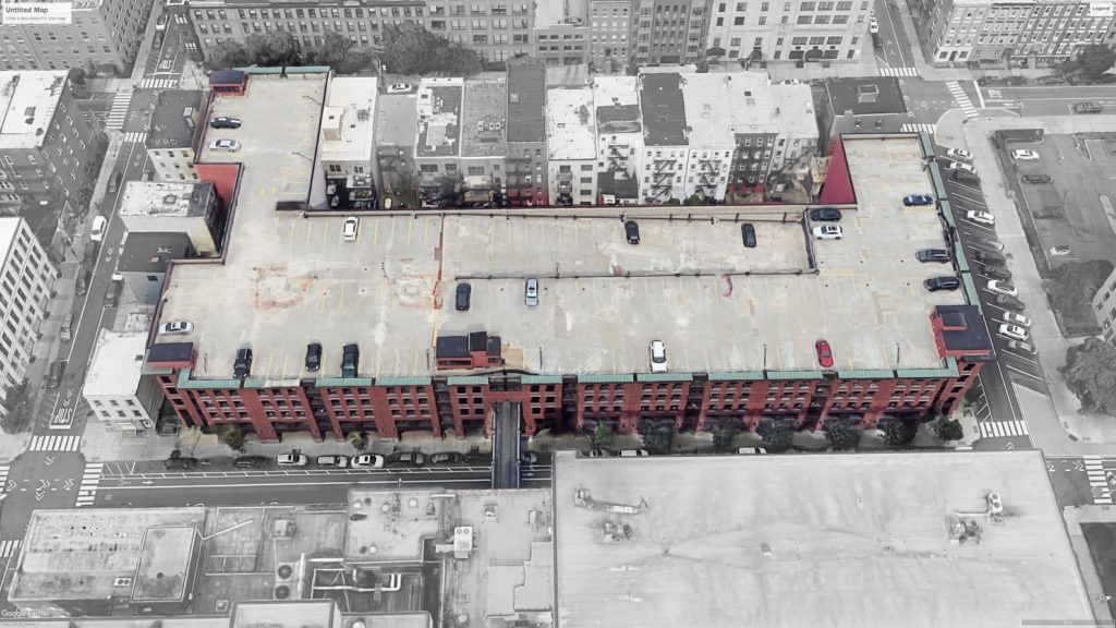 Aerial view of a large parking garage.