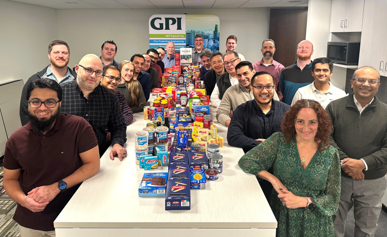 Group of people in front of a food donation