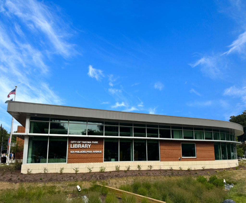Modern library building with greenery